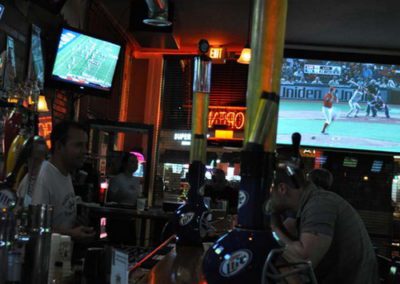 Man watching sports at bar