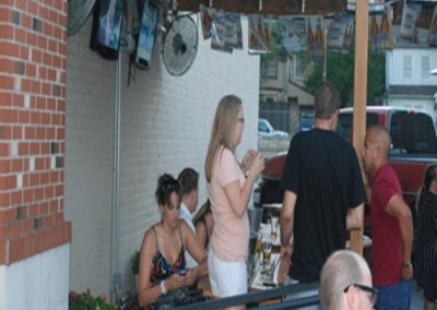 Lively Patio Gathering with Cold Beers at The Pour House, Dallas - Fun, Drinks, Friends